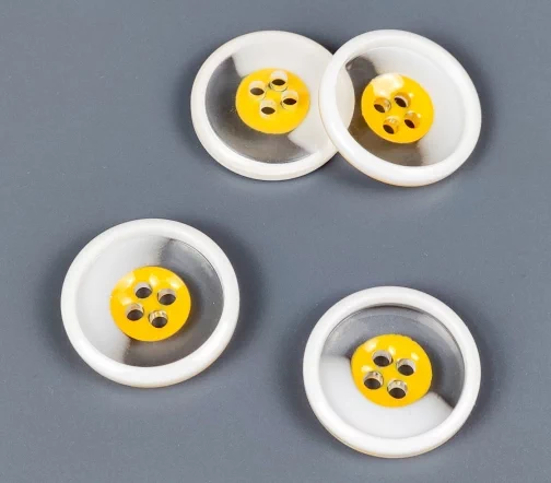 Пуговица, 4отв., пластик, цв. прозрачный/белый, 23 мм