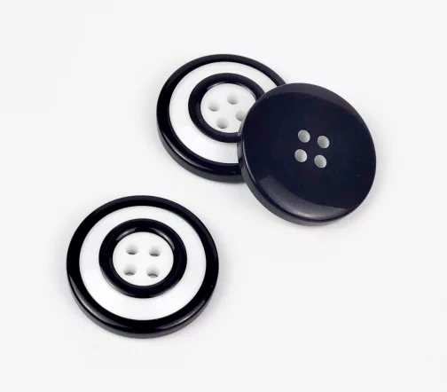 Пуговица Union Knopf, 4 отв., пластик, цвет белый/черный, 28 мм