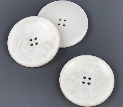 Пуговица, Union Knopf, "Муаровая", 4 отв., пластик, цвет молочный, 34 мм